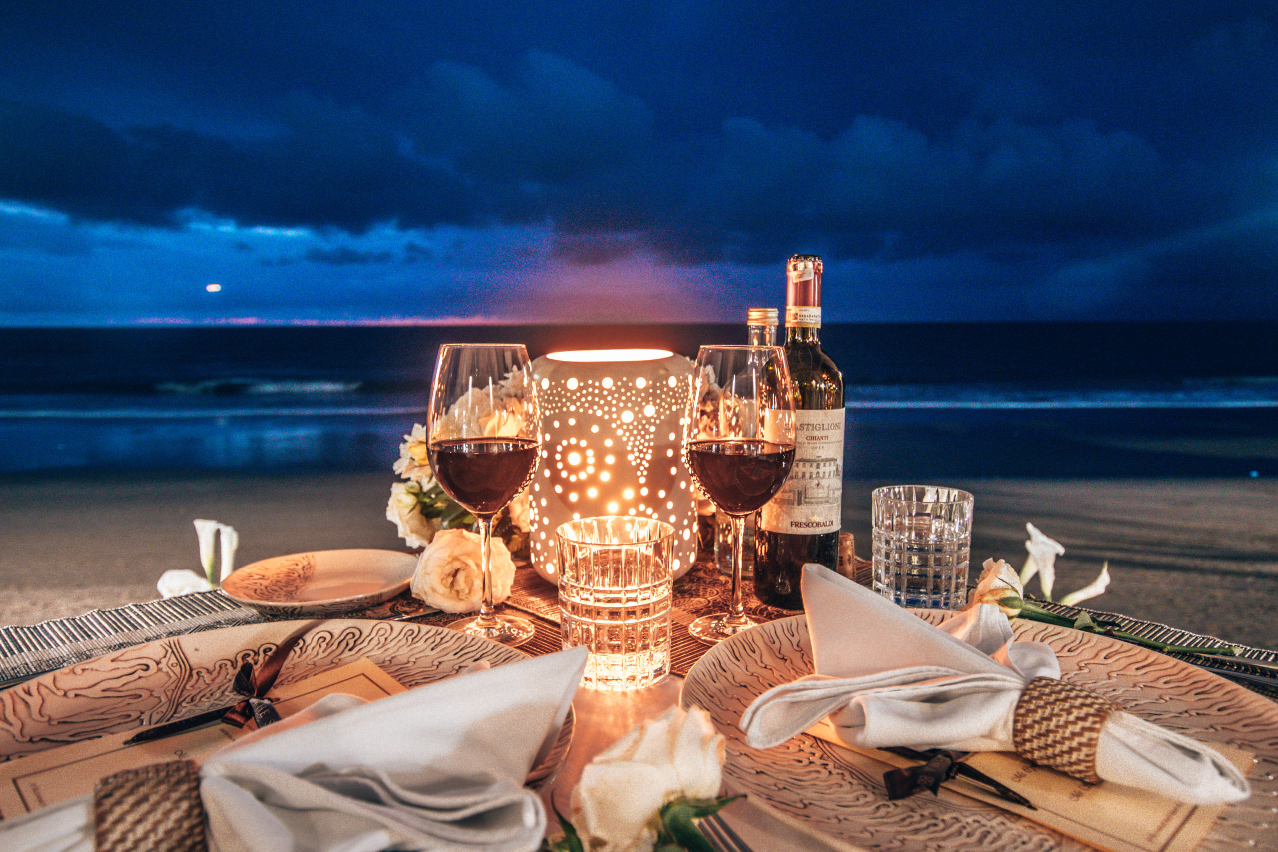 romantic dinner table on the beach