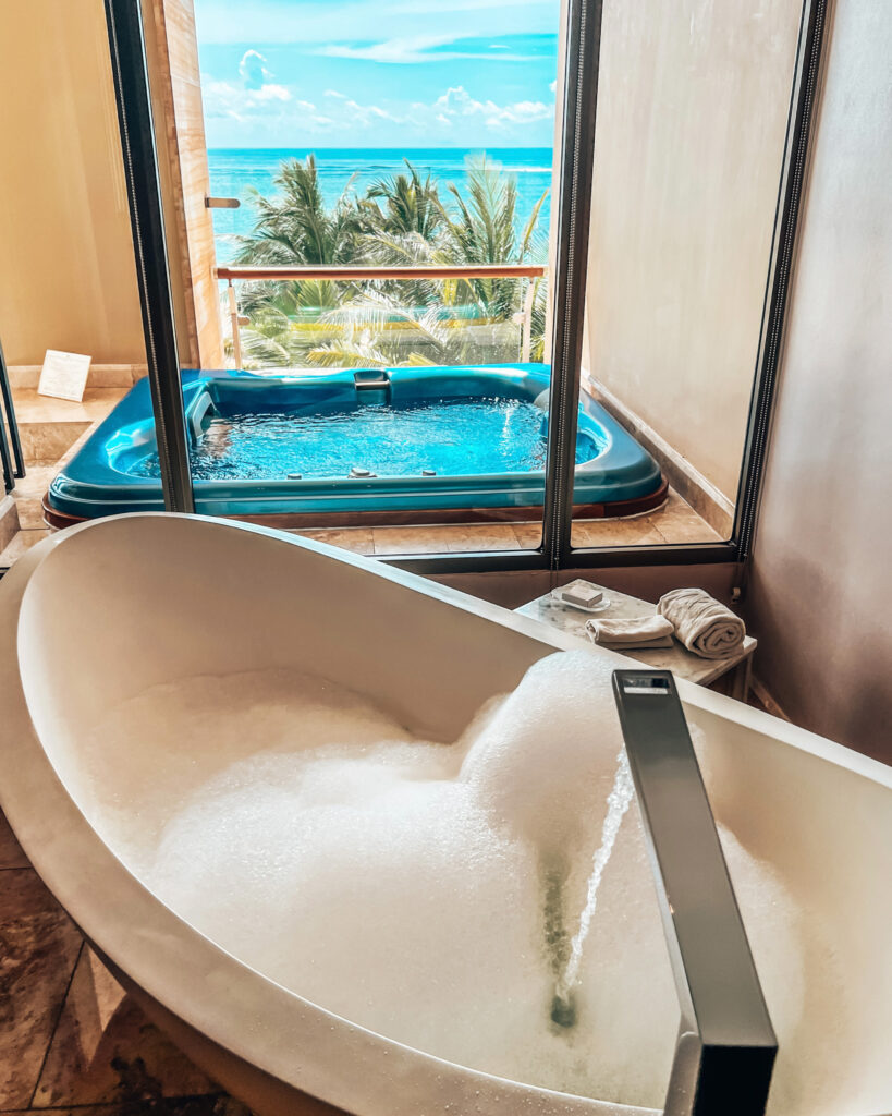 Jacuzzi and bathtub in the Baron beachfront suite at The Mulia Nusa Dua, Bali